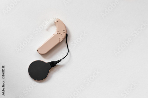 cochlear implant on the arm. hearing aid