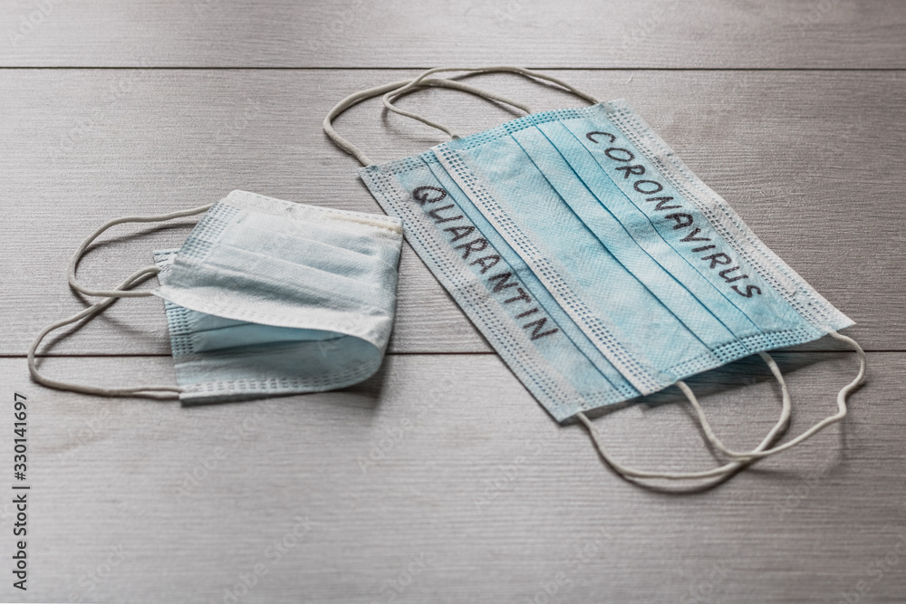 Blue medical face masks with the inscription Blue medical face masks with the inscription