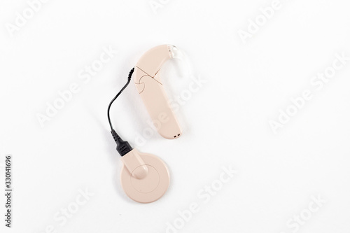 cochlear implant on the arm. hearing aid