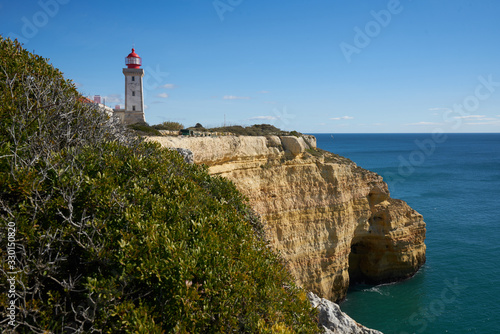 Farol de Alfanzina Lighthouse landscape in Algarve, Portugal