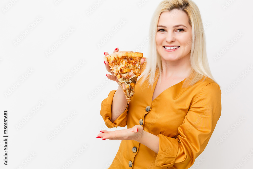 Happy young woman eating slice of hot pizza, isolated on white Happy young woman eating slice of hot pizza, isolated on white