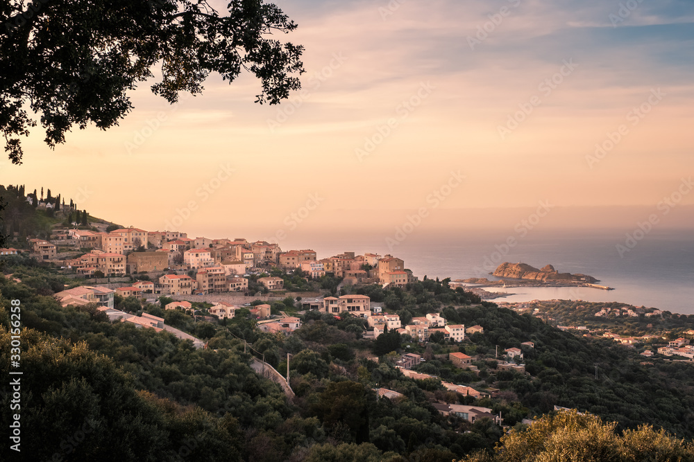 Sunset over village of Monticello in Corsica