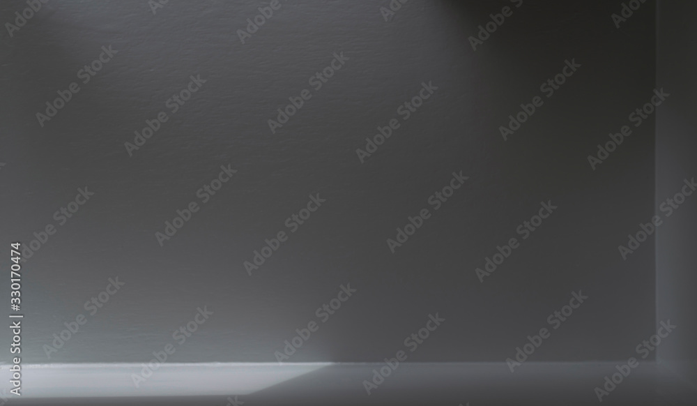 Abstract image of refraction of light and shadow in a gray room Abstract image of refraction of light and shadow in a gray room