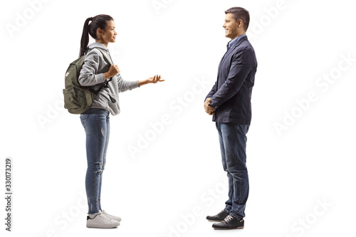 Female student talking to a young man