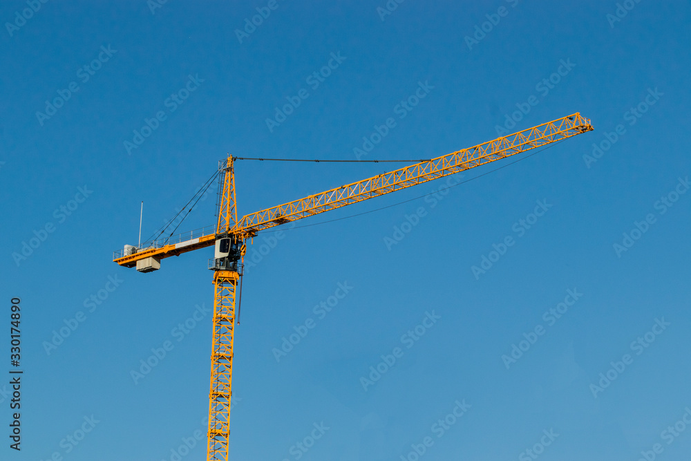 crane against blue sky crane against blue sky