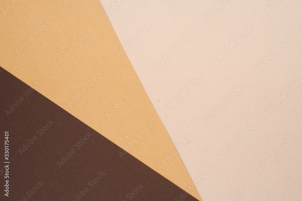 Background from recycled textured paper forming shades sections of dark brown Background from recycled textured paper forming shades sections of dark brown