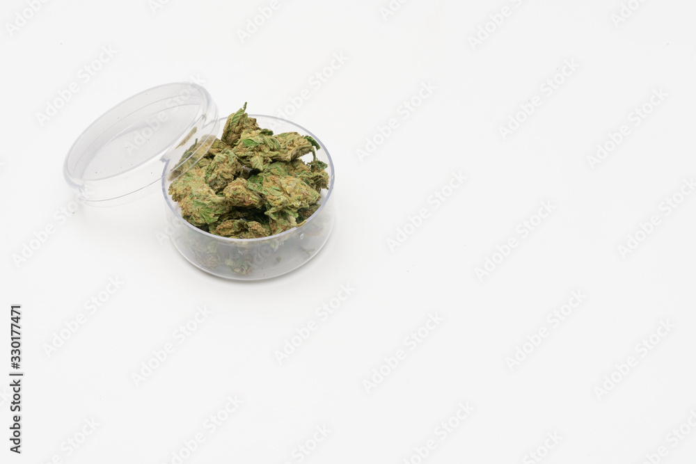 Marijuana cannabis Medicinal, weed joint In a glass container, drugs. Marijuana cannabis Medicinal, weed joint In a glass container, drugs.