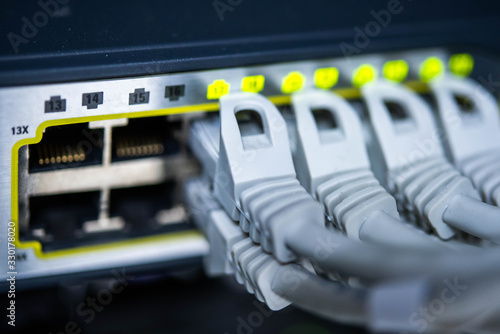 network cables connected to the switch in data center