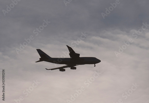 Airliner jumbo silhouette flying