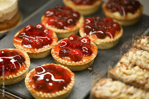 Wallpaper Mural close up of red fruit tartalets Torontodigital.ca