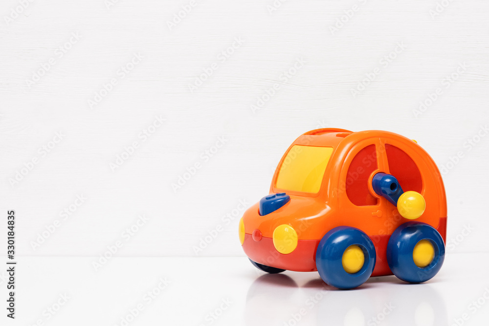 Children car toy on white background with copy space. Children car toy on white background with copy space.