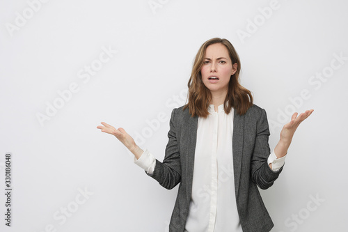 Businesswoman looking mad and resignedly photo