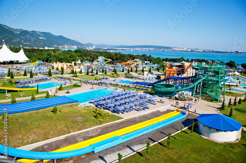 Panorama of the water Park and various water slides and attractions on a bright Sunny day photo