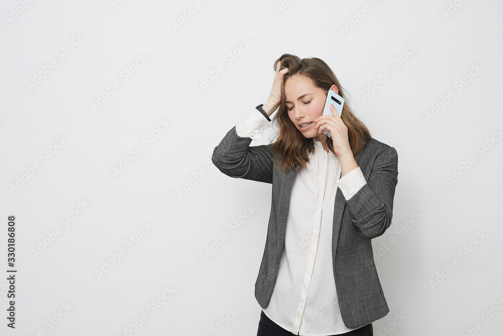businesswoman having a frustating phone call businesswoman having a frustating phone call