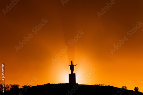 Monument Sagrado corazón de Jesus on top of mountain Naranco in Oviedo at night, Asturias. Religion. 