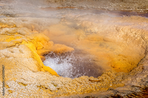 Close up of the boiling water of the Pump Geyser, Yellowstone © Martina