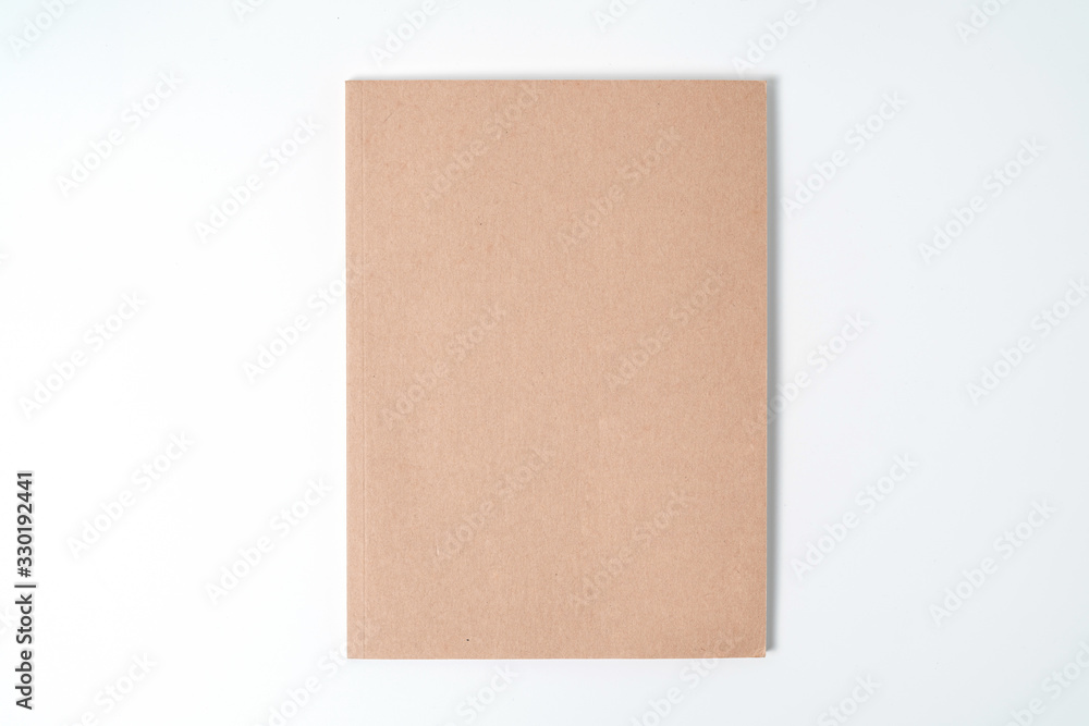 Brown spiral notebook isolated on white background.top view Brown spiral notebook isolated on white background.top view