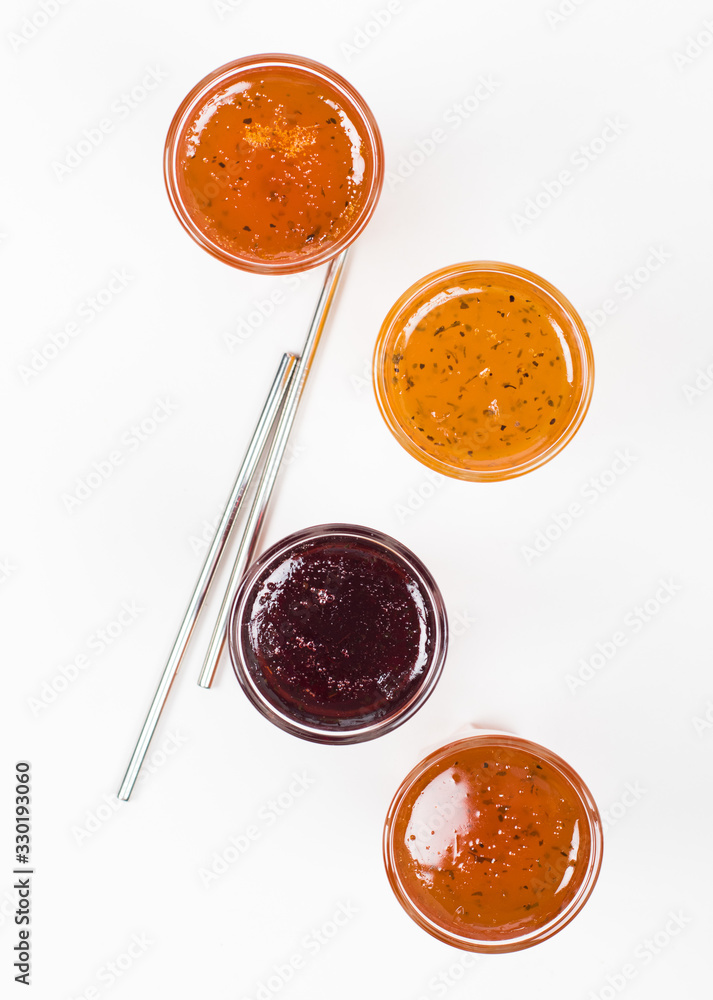 Herbal fruit berry drink in a glass, pineapple with Basil, pomegranate with mint, sea buckthorn with oregano on a white background top view Herbal fruit berry drink in a glass, pineapple with Basil, pomegranate with mint, sea buckthorn with oregano on a white background top view