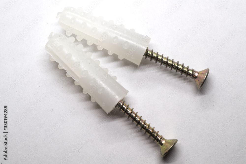 dowel with screw on a white background dowel with screw on a white background