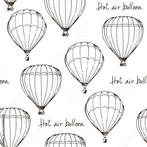 Hot air balloons vector seamless pattern, hand drawn aerostat with text isolated on white background