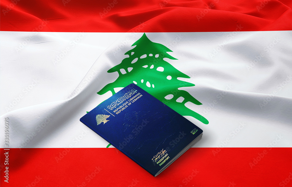 Official passport of lebanon,lebanese passport on the top of a satin lebanon flag