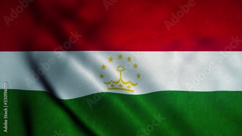 Tajikistan flag waving in the wind. National flag of Tajikistan. Sign of Tajikistan seamless loop animation. 4K photo