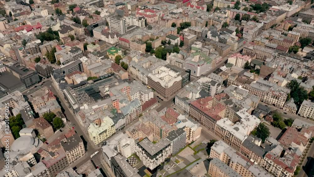 RIGA, LATVIA - MAY, 2019: Aerial panorama view of the Riga's city roofs, houses and building of the Latvian capilal.