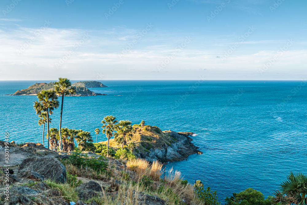 Landscape of Promthep cape in morning with sunlight and beautiful blue sky (Phuket, Thailand)