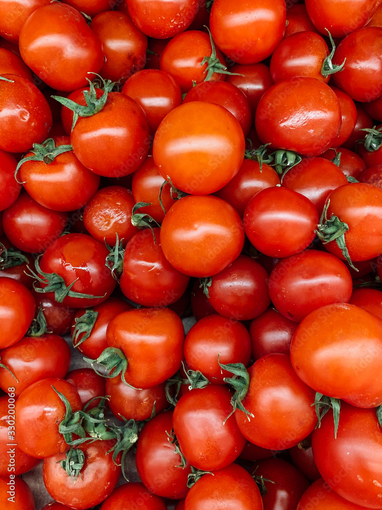 lots of ripe delicious red tomatoes for eating like a background lots of ripe delicious red tomatoes for eating like a background