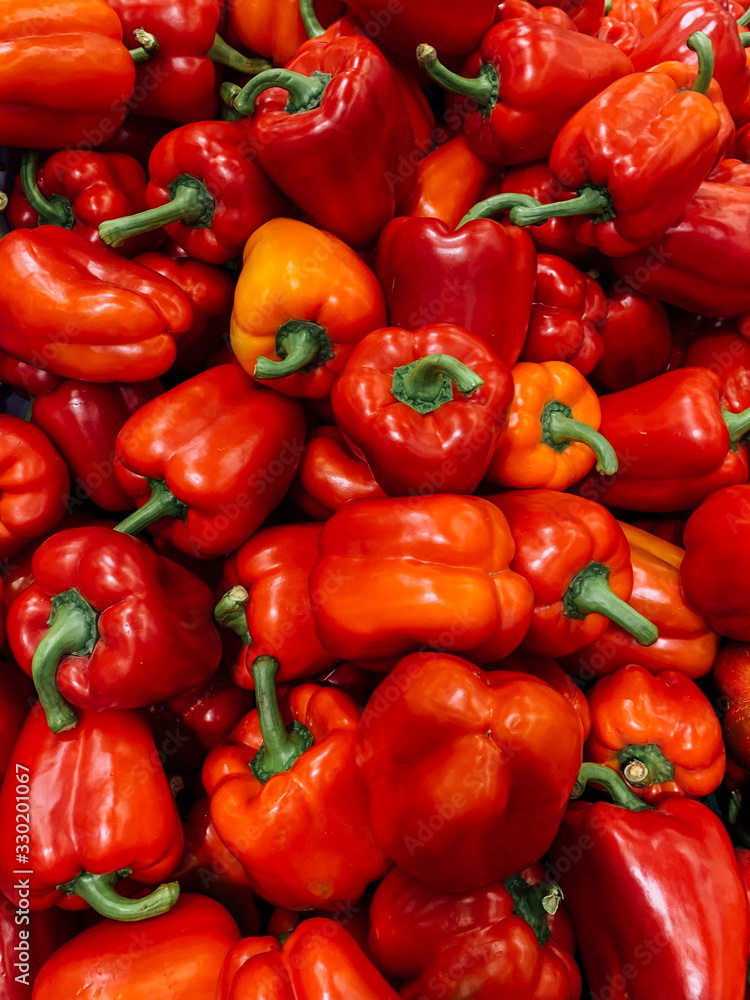 lots of ripe delicious Bulgarian peppers for eating a background
