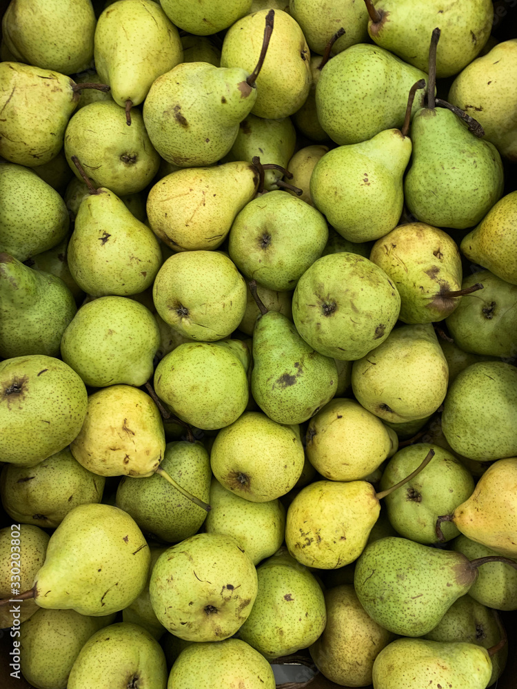 lots of ripe delicious sweet pears to eat like a background
