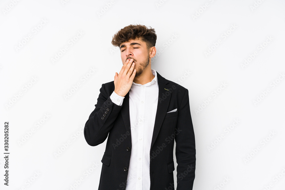 Young arabian business man isolated yawning showing a tired gesture covering mouth with hand. Young arabian business man isolated yawning showing a tired gesture covering mouth with hand.
