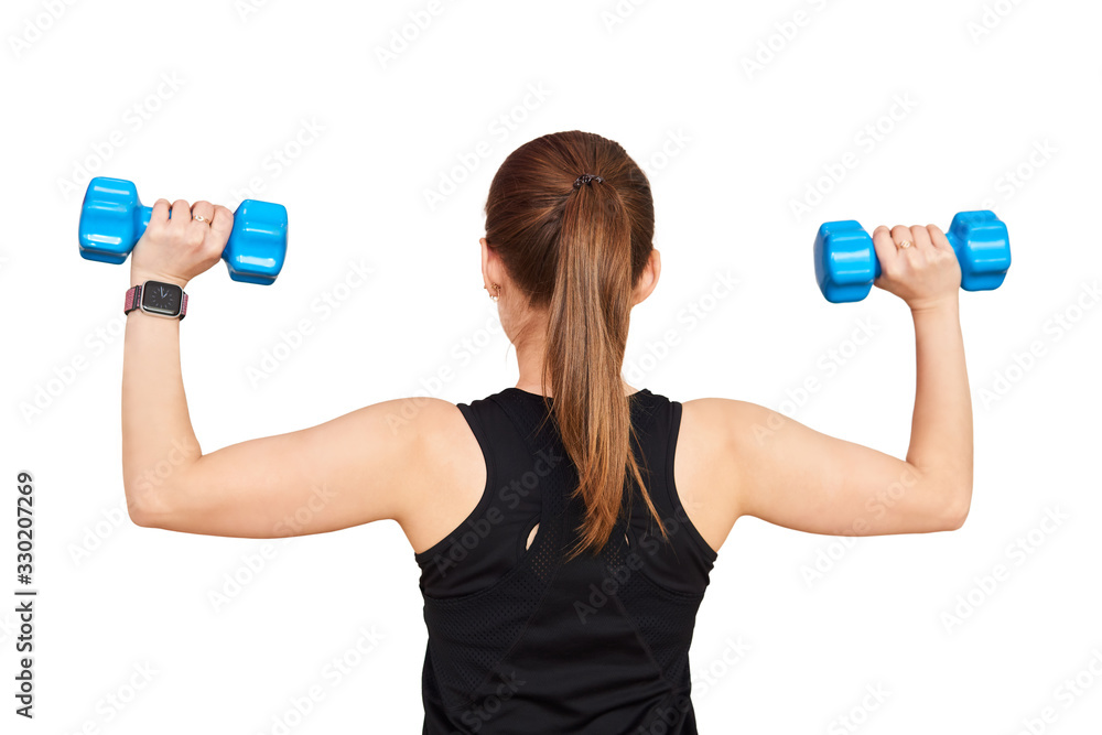 woman performs an exercise with dumbbells, view from the back on a white background woman performs an exercise with dumbbells, view from the back on a white background