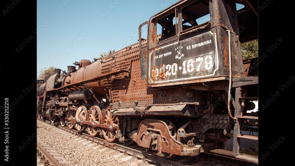 old train. rusty iron. iron wheels. steam locomotive museum