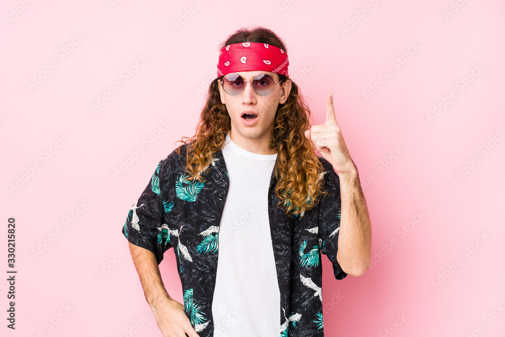 Young hippie caucasian man isolated having an idea, inspiration concept. Young hippie caucasian man isolated having an idea, inspiration concept.