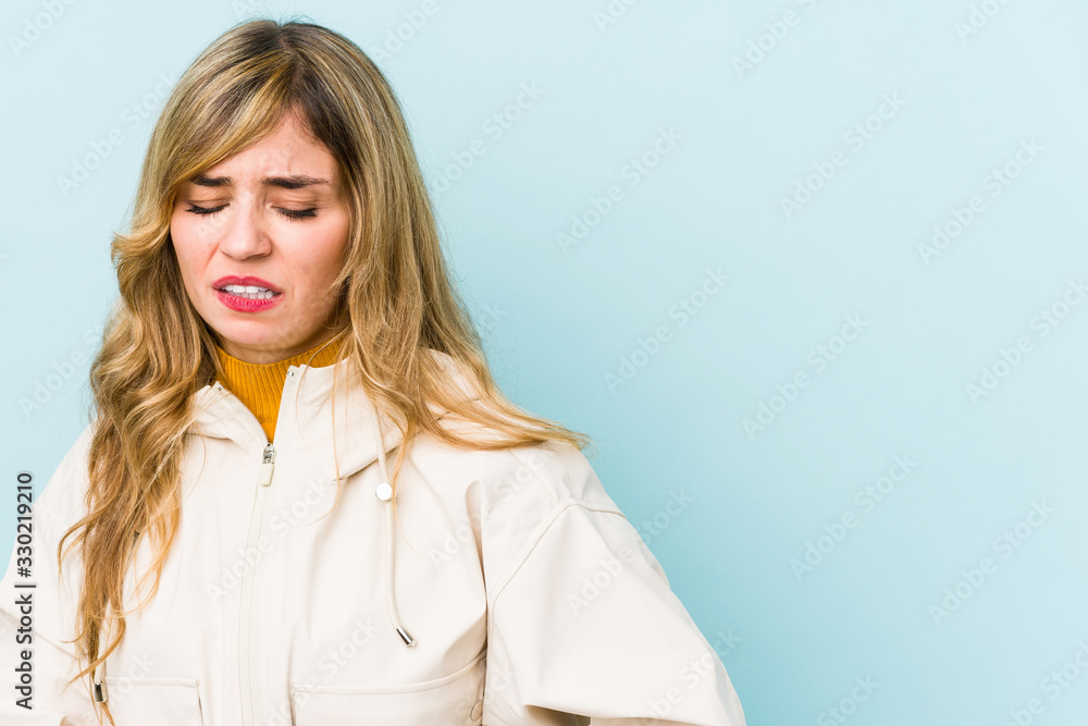 Young blonde caucasian woman having a liver pain, stomach ache. Young blonde caucasian woman having a liver pain, stomach ache.