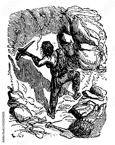 Robinson Crusoe defending the cave, vintage illustration photo