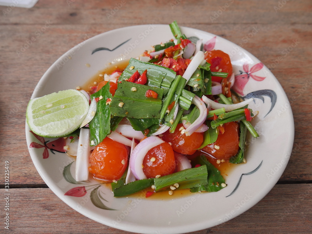 Egg yolk salad on a plate Placed on the dining table