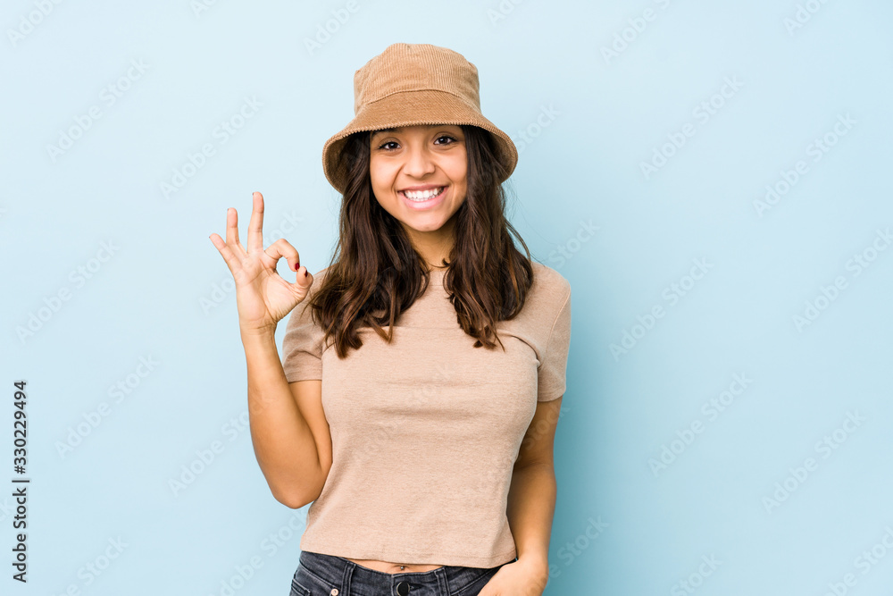Young mixed race hispanic woman isolated cheerful and confident showing ok gesture. Young mixed race hispanic woman isolated cheerful and confident showing ok gesture.