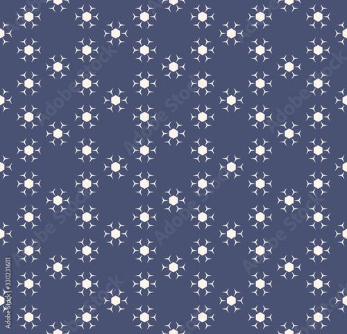 Subtle vector seamless pattern. Vector abstract geometric background with small flower silhouettes, snowflakes in hexagonal grid. Elegant deep blue and white texture. Simple minimalist repeat design