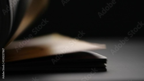 Close-up of flicking book page in slow motion