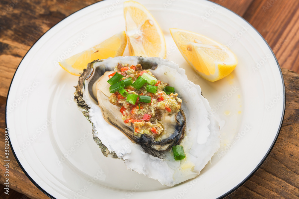 Barbecue overbaked fresh opened oyster with garlic, Barbecue overbaked fresh opened oyster with garlic,