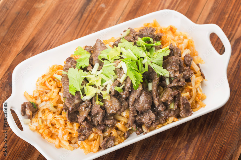 China delicacy-Fried rice noodles with beef China delicacy-Fried rice noodles with beef