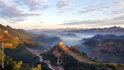 Great Wall, fog, and mountains at sunset in China © Wheat field