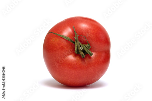 Ripe red tomato alone, isolated.