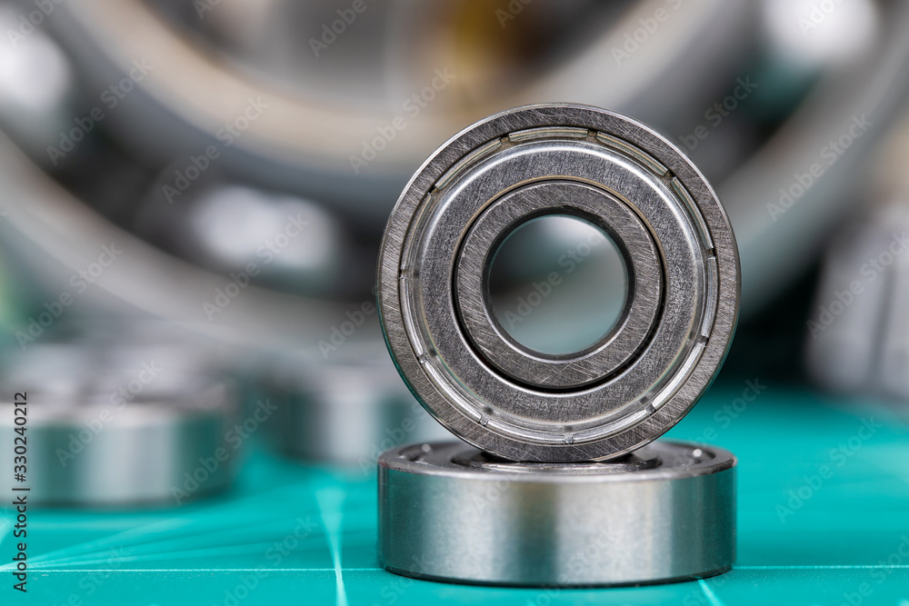 Closeup of steel ball bearings on cutting mate.. Closeup of steel ball bearings on cutting mate..
