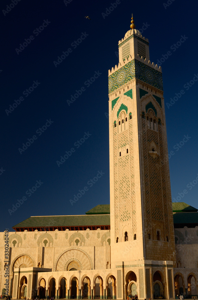 Minaret of the Hassan II Mosque in Casablanca Morocco at sunset