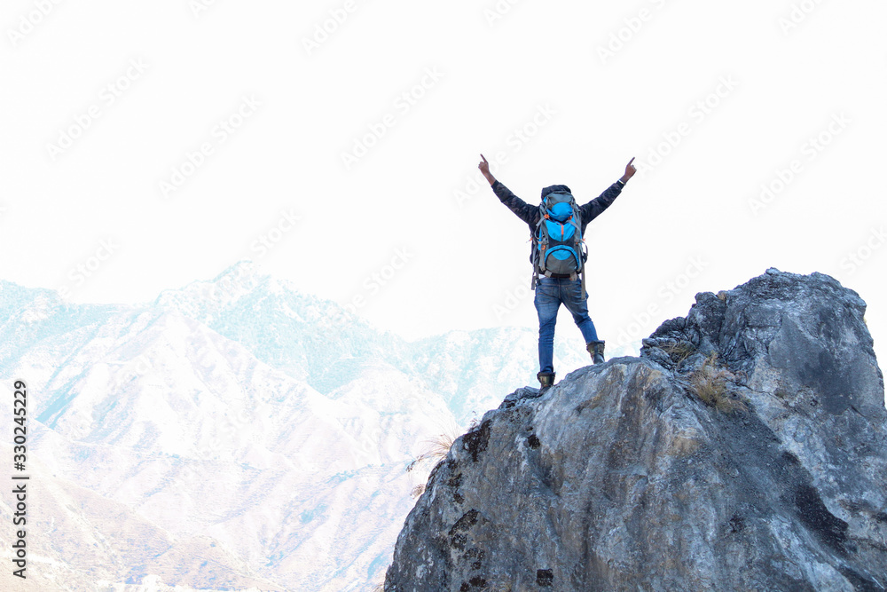 Man on the peak of himalayas