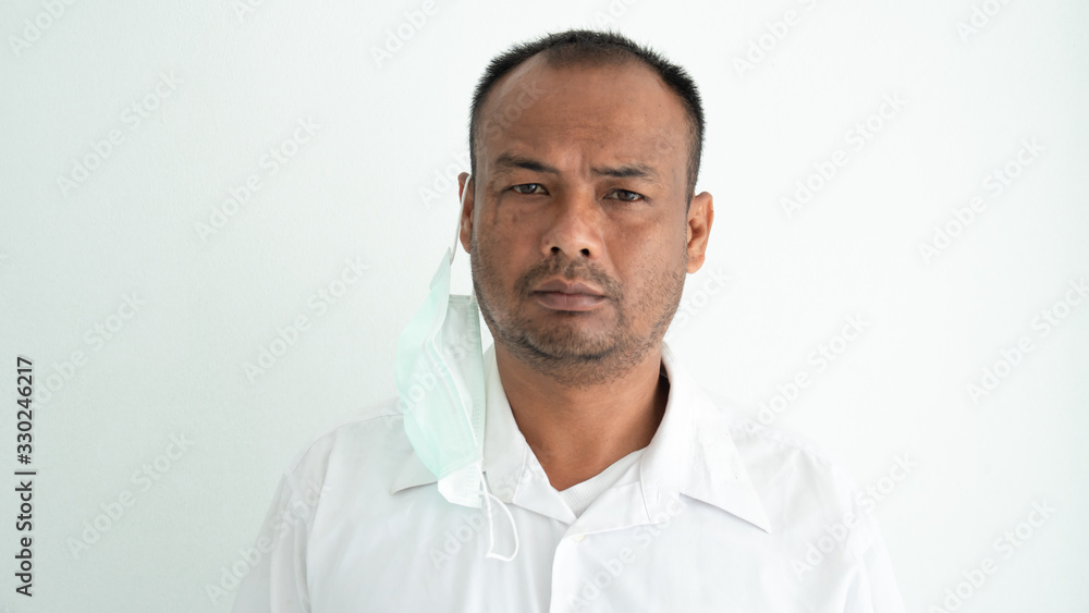 Young man sick and wearing mask on face Young man sick and wearing mask on face