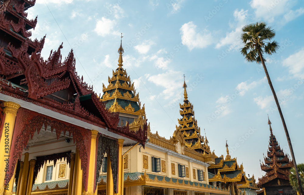 Fototapeta premium Shwedagon Pagoda golden intricate temples.